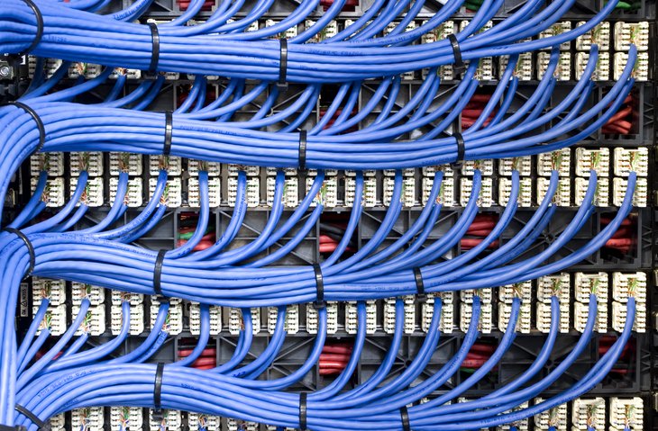 Structured communication cabling, network racks and building technology systems
